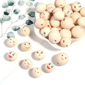 Bulk wooden craft beads with assorted smiley face designs for DIY jewelry making