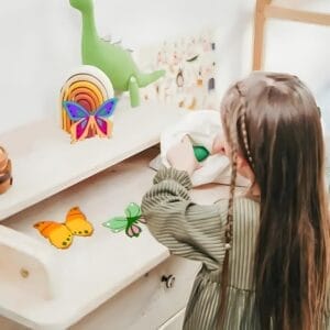 Colorful wooden butterfly cutouts, perfect for kids' crafts or home decor. Eco-friendly and beautifully designed.