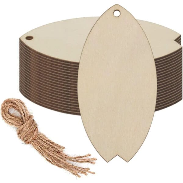 Stack of oval Wood Surfboard Cutouts with a single tag in front, each featuring a small hole at the top, and a bundle of brown twine beside them.