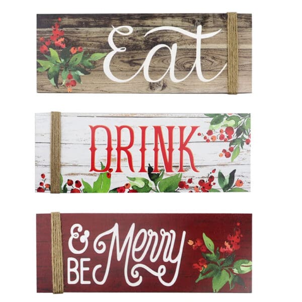 Three rectangular Wooden Christmas Signs with floral decorations and rope accents read "Eat," "Drink," and "& Be Merry" in decorative fonts.