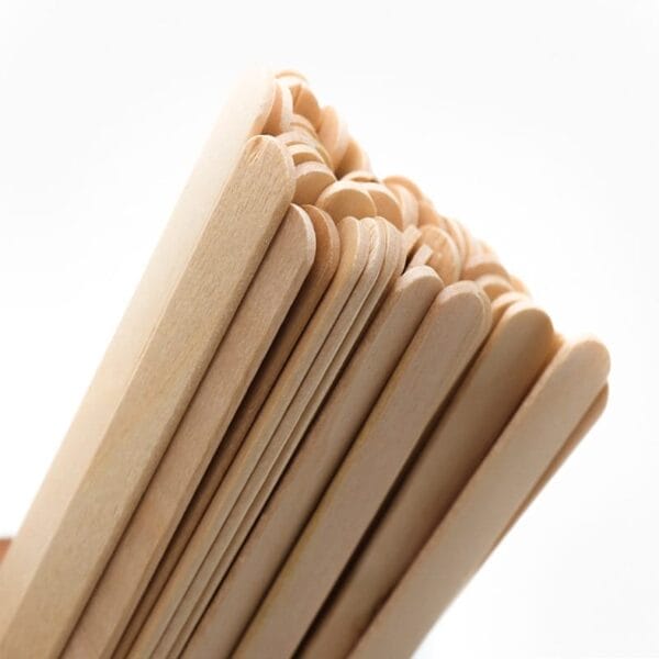 A close-up of a bundle of Wood Sticks For Crafts, fanned out against a plain white background.