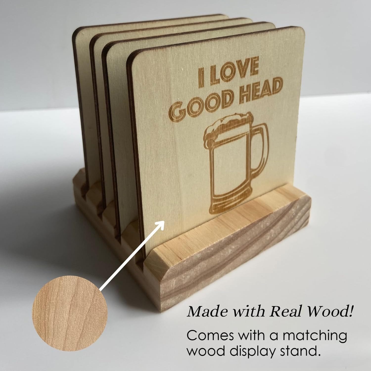 A set of Wooden Beer Coasters with a beer mug and the text "I LOVE GOOD HEAD," displayed in a matching wooden stand. An arrow highlights the quality wood material and real wood construction for lasting durability.