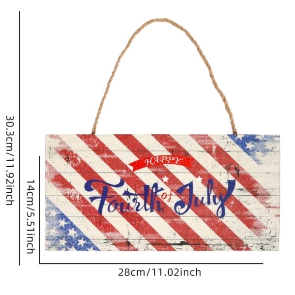 A rectangular wooden American flag sign with red and white stripes, blue stars, and the text "Happy Fourth of July." Sign measures 28cm x 14cm and hangs by a rope.