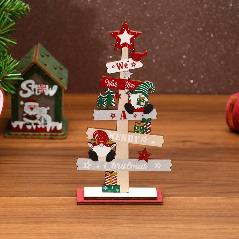 A small Christmas Wooden Ornament with red, white, and green accents, featuring signs that read "We wish you a Merry Christmas," stars, gifts, and festive figures—perfect as charming Christmas tree decorations.