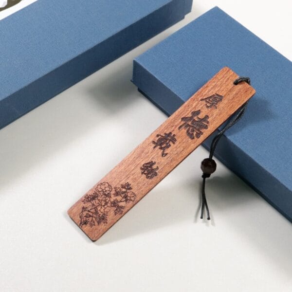 Vintage Chinese Style Redwood Engraved Bookmark with floral design and characters. Custom wood craft.