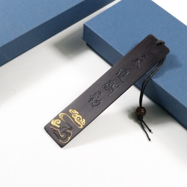 Vintage Chinese Style Redwood Engraved Bookmark with golden clouds and tassel. Custom wood crafts.