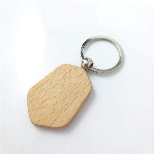 Laser cut wood keychain in beech wood with metal ring, sustainable wholesale option