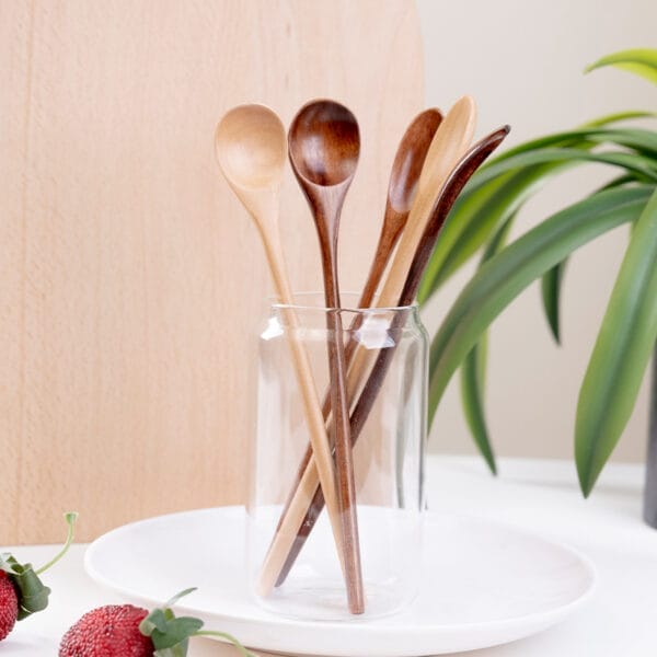 Wooden spoons in glass jar; coffee bean & honey spoons. Wholesale supplier.