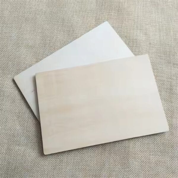 Two laser-cut wood blanks for custom business cards. Wholesale supplier of custom blanks.
