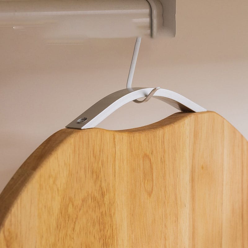 Round wooden cutting board hanging on a hook. Eco-friendly, wholesale.
