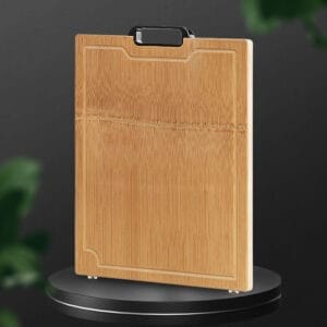 Large, rectangular solid wood chopping board with a handle.