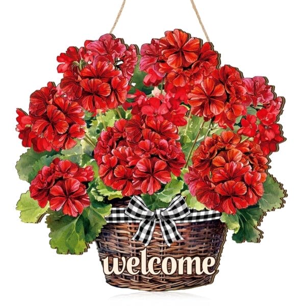 A basket of vibrant red geranium flowers with green leaves, a black and white plaid bow, and a "welcome" sign hanging on this charming wood artwork.