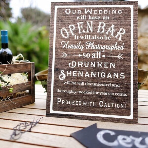 Rustic wooden wedding open bar sign: "Our wedding will have an open bar. Proceed with caution!