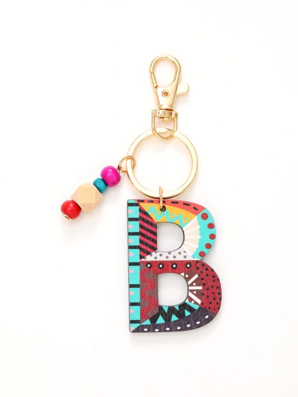Colorful wooden letter B keychain with wood beads. Wholesale wood bead keychain manufacturer.