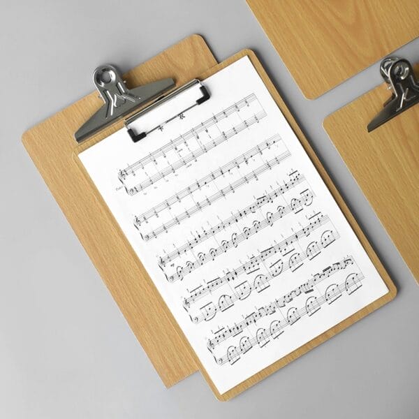 Wooden clipboard with sheet music, ideal for A4 menus or tickets. Bulk custom wood clipboards available.