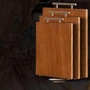 Set of three solid wood cutting boards with stainless steel handles. Bulk wood cutting boards.