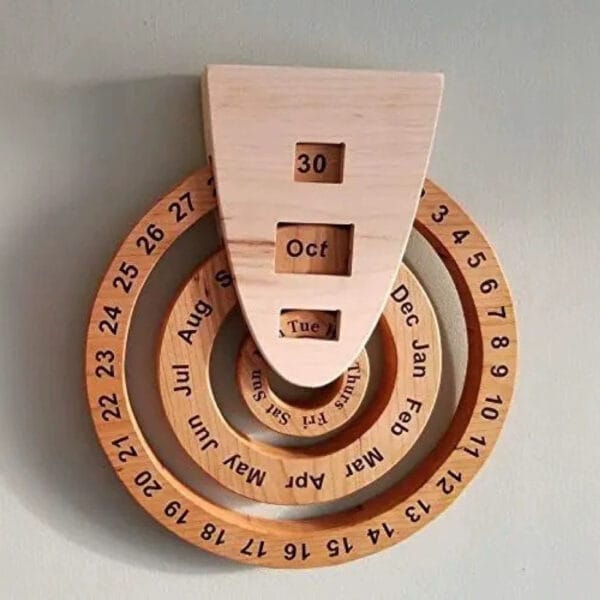 A wooden perpetual calendar with rotating rings displays the date, month, and day—set to 30 Oct, Tue—crafted by a renowned calendar manufacturer.
