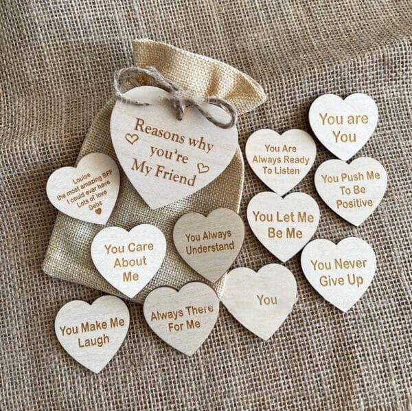 Wooden heart-shaped friendship gift with engraved reasons why you're my friend. Unique decorative wood pieces.