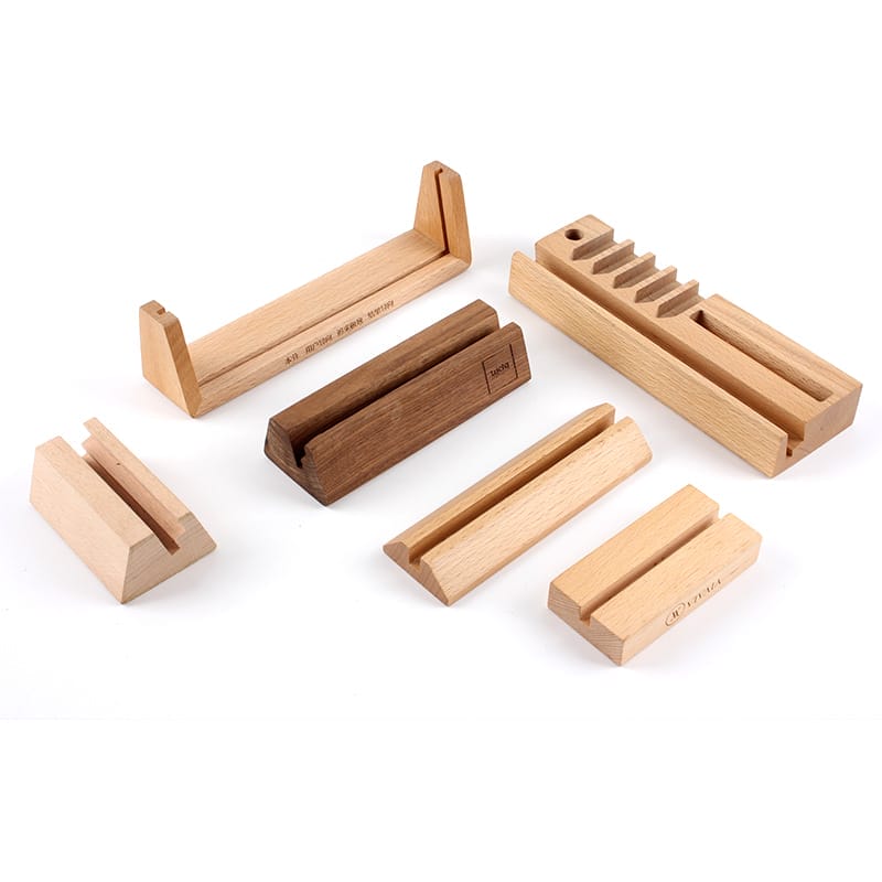 Six wooden holders of different shapes and sizes are displayed on a white background.