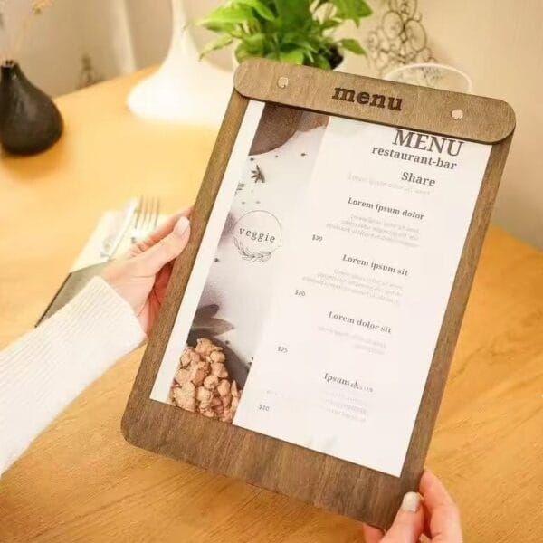 Rustic wooden menu holder with restaurant menu; "menu" and "Share" visible.