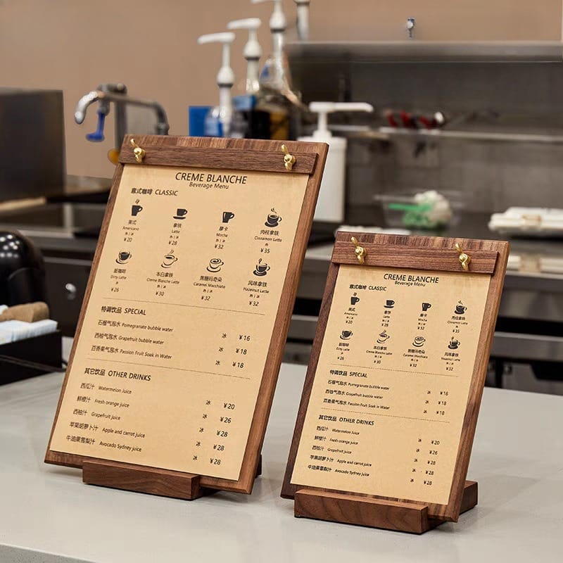 Two dark wood menu holders display beverage menus. Black walnut display stands for restaurants.