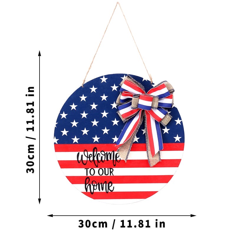 Round Wooden Door Hanger featuring an American flag design, a festive red, white, and blue bow, "Welcome to Our Home" text—perfect as a wood plaque for celebrating Independence Day USA. Measures 30cm (11.81in) in diameter.