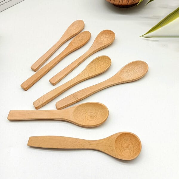 Assortment of small, handcrafted wooden spoons. Ideal for wholesale and distribution by a wooden spoon manufacturer.