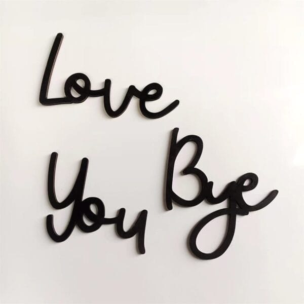 Black cursive words "Love You Bye" are arranged on a plain white background, perfect as elegant wood wall decor for any space.
