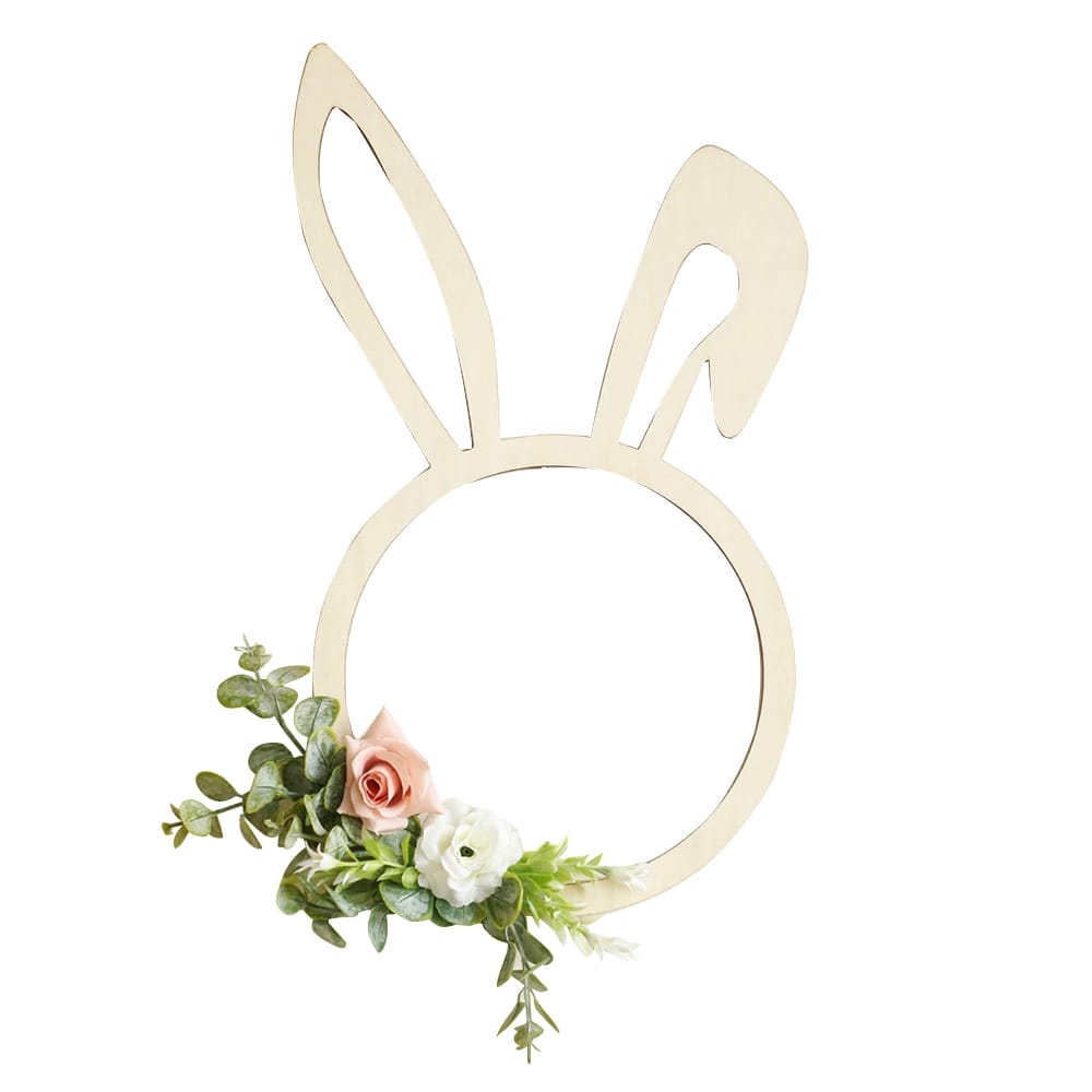 Wood wall decoration featuring a wooden bunny head outline with a floral arrangement at the bottom left, adorned with pink and white flowers alongside green leaves.