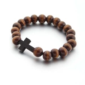 A stylish wooden bead bracelet made of round brown beads, featuring a striking black wooden cross charm.