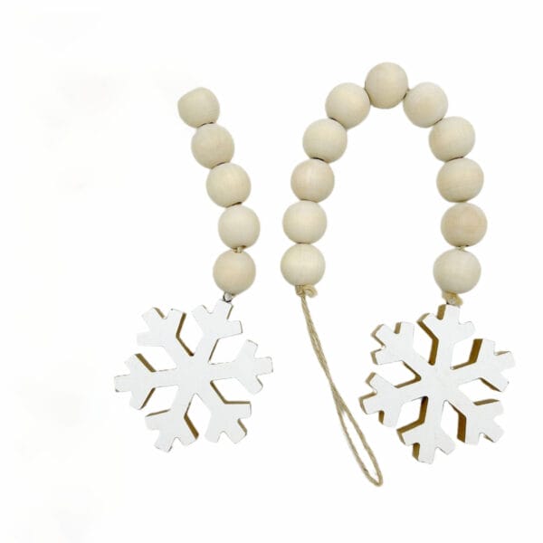 Wooden bead garland with snowflake charms. Wholesale hanging decoration.