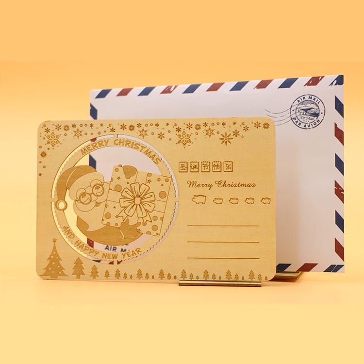 Laser-cut wooden Christmas gifts featuring Santa with a gift. Wholesale supplier of wooden Christmas gifts.