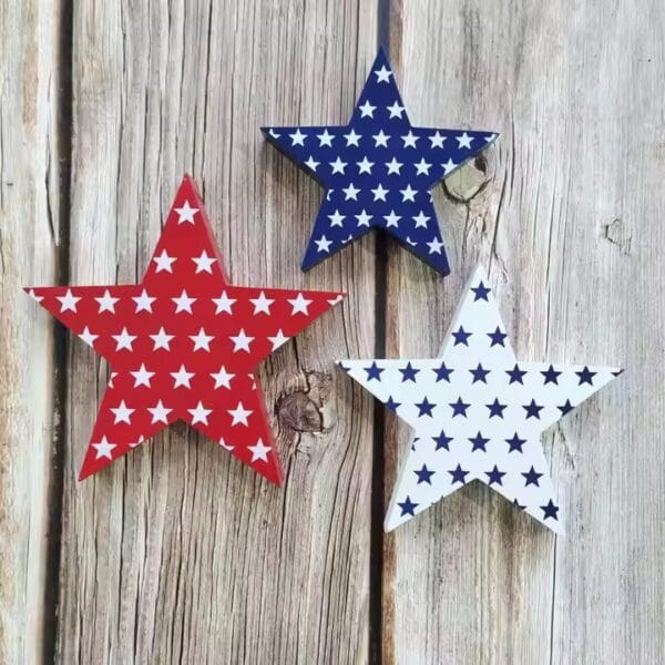 Three patriotic wooden stars: red, white, and blue. Custom wooden crafts for decoration.