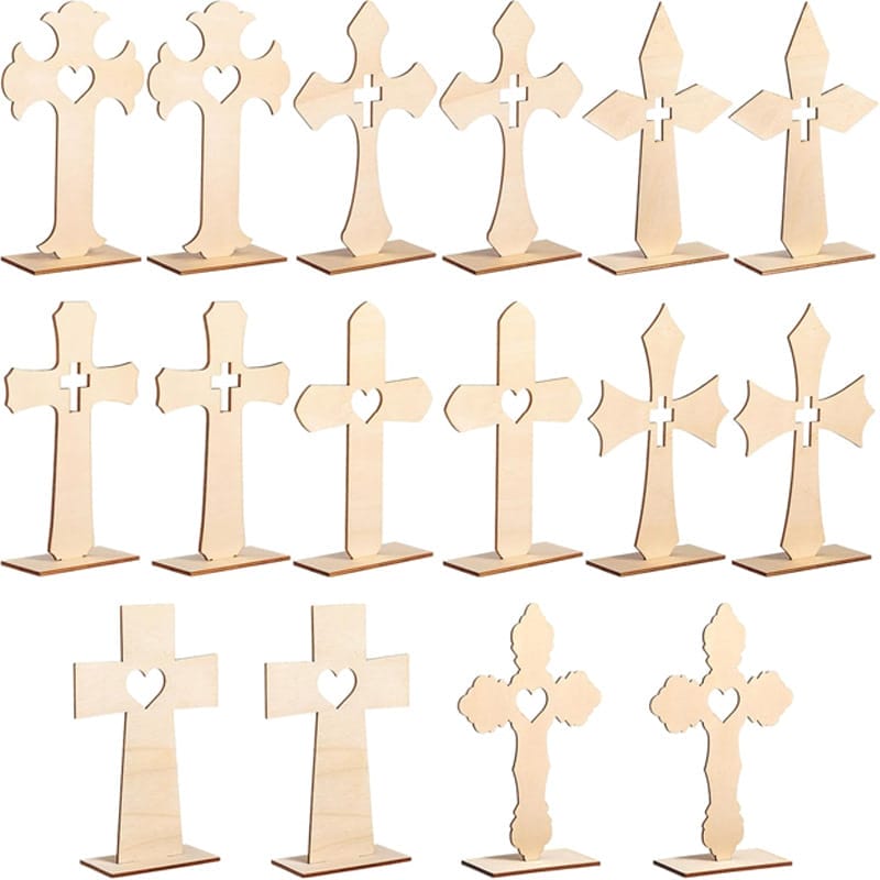 A set of fifteen unfinished wooden crosses for crafts, each featuring a cut-out heart or cross in the center, arranged neatly in three rows.