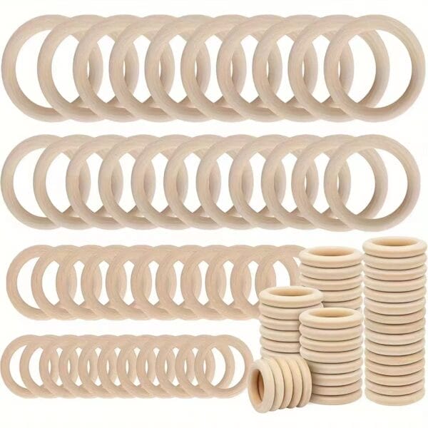 A set of eco-friendly, light-colored wooden curtain rings arranged in rows and small stacks on a white background.