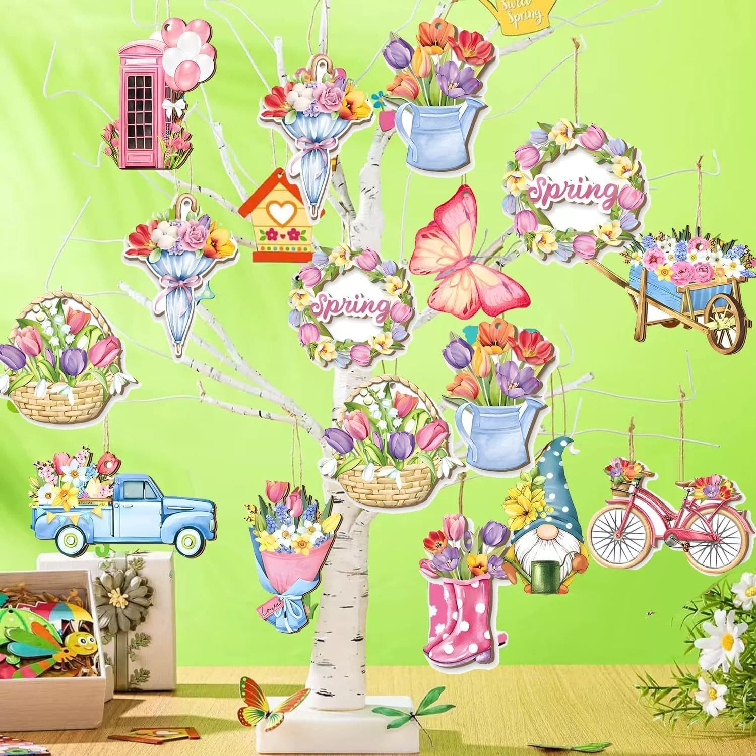 A decorative white tree adorned with colorful spring-themed ornaments, including laser-cut wooden flowers, baskets, vehicles, wreaths, and butterflies on a bright green background. Perfect for wholesale or as unique wooden flower decorations.
