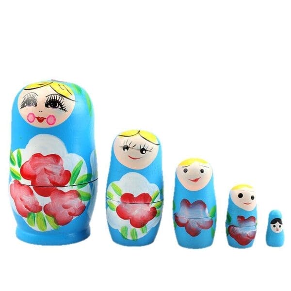 Five blue Matryoshka Dolls with intricate floral patterns are arranged in a row from largest to smallest, showcasing traditional Russian wooden giftware.