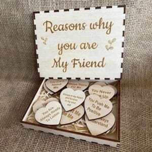Wooden box with engraved "Reasons why you are My Friend" and small wood hearts, each with a unique message of friendship. Unique friendship gift.