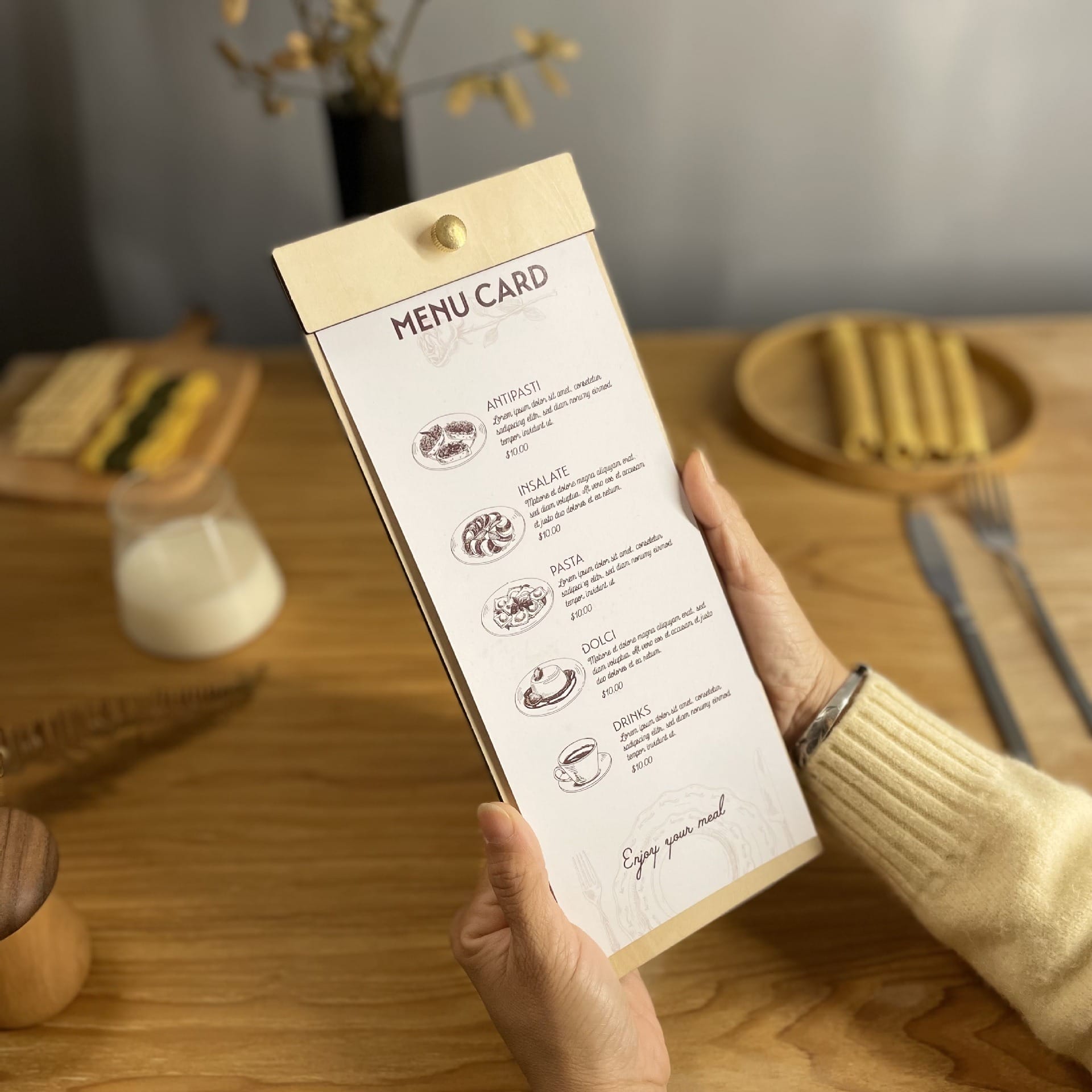 Person holding a wooden menu board with replaceable inserts. Eco-friendly restaurant menu design.