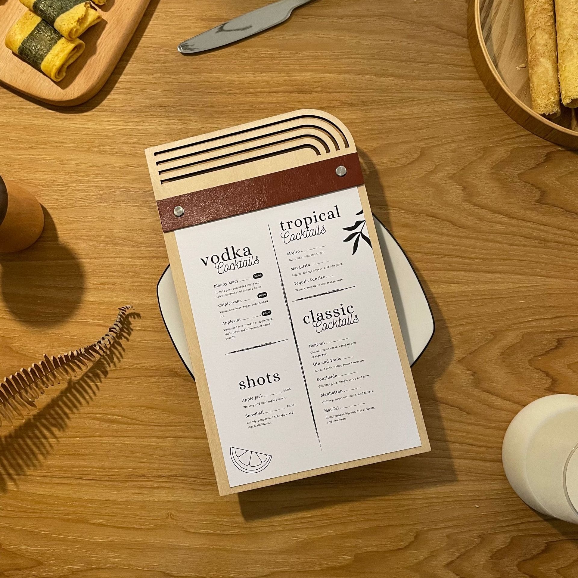 Wooden menu board with leather strap, showcasing cocktails & shots. Eco-friendly design with replaceable inserts.