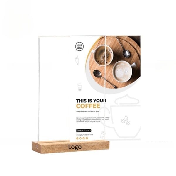 Acrylic menu holder with wooden base displaying coffee shop advertisement.