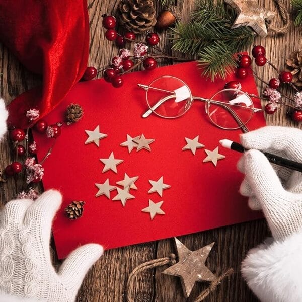 Santa crafts wooden star shapes on a red card. Wholesale wooden craft stars.