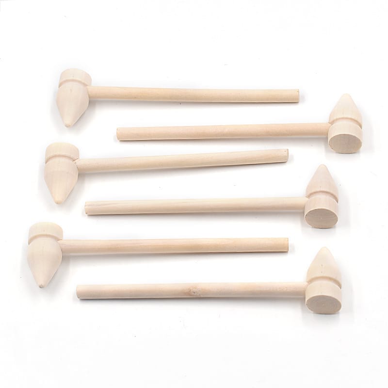 Five small mini wooden hammer toys with cylindrical handles and cone-shaped heads are arranged in a neat row on a white background—perfect for Wooden Sticks Crafts or available for wholesale orders.