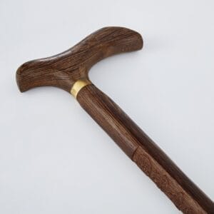 Wooden walking cane made from premium chicken wing wood with a curved handle and brass accent. A long stick wood for support and style.