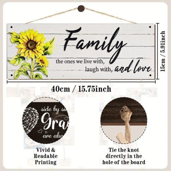 A rectangular wooden wall decor sign featuring a sunflower and the words "Family, the ones we live with, laugh with, and love." Measures 40cm x 15cm and includes rope for hanging—perfect from a wholesale manufacturer.