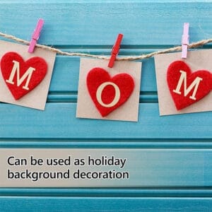 Handmade MOM decoration with red felt hearts and wooden letters, perfect for Mother's Day or holiday background
