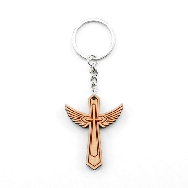 Personalised wooden keychain with laser-engraved cross and wings design. DIY blank wood keychain with metal ring.