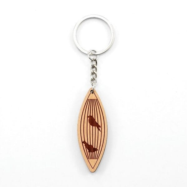 Personalised wooden keychain featuring a laser-engraved birdcage design with two birds inside