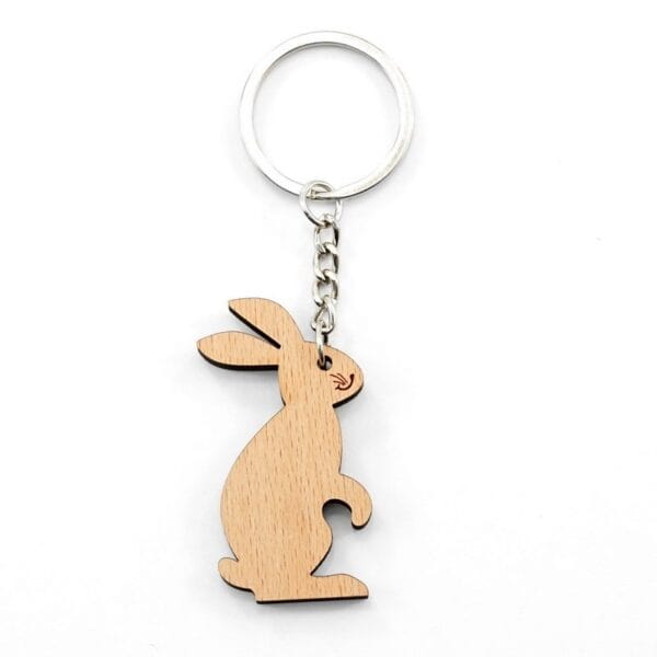 Personalised wooden keychain featuring a rabbit design with metal ring.