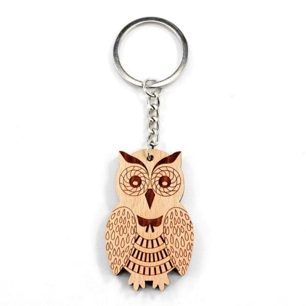 Personalised wooden keychain with laser-engraved owl design and metal ring.